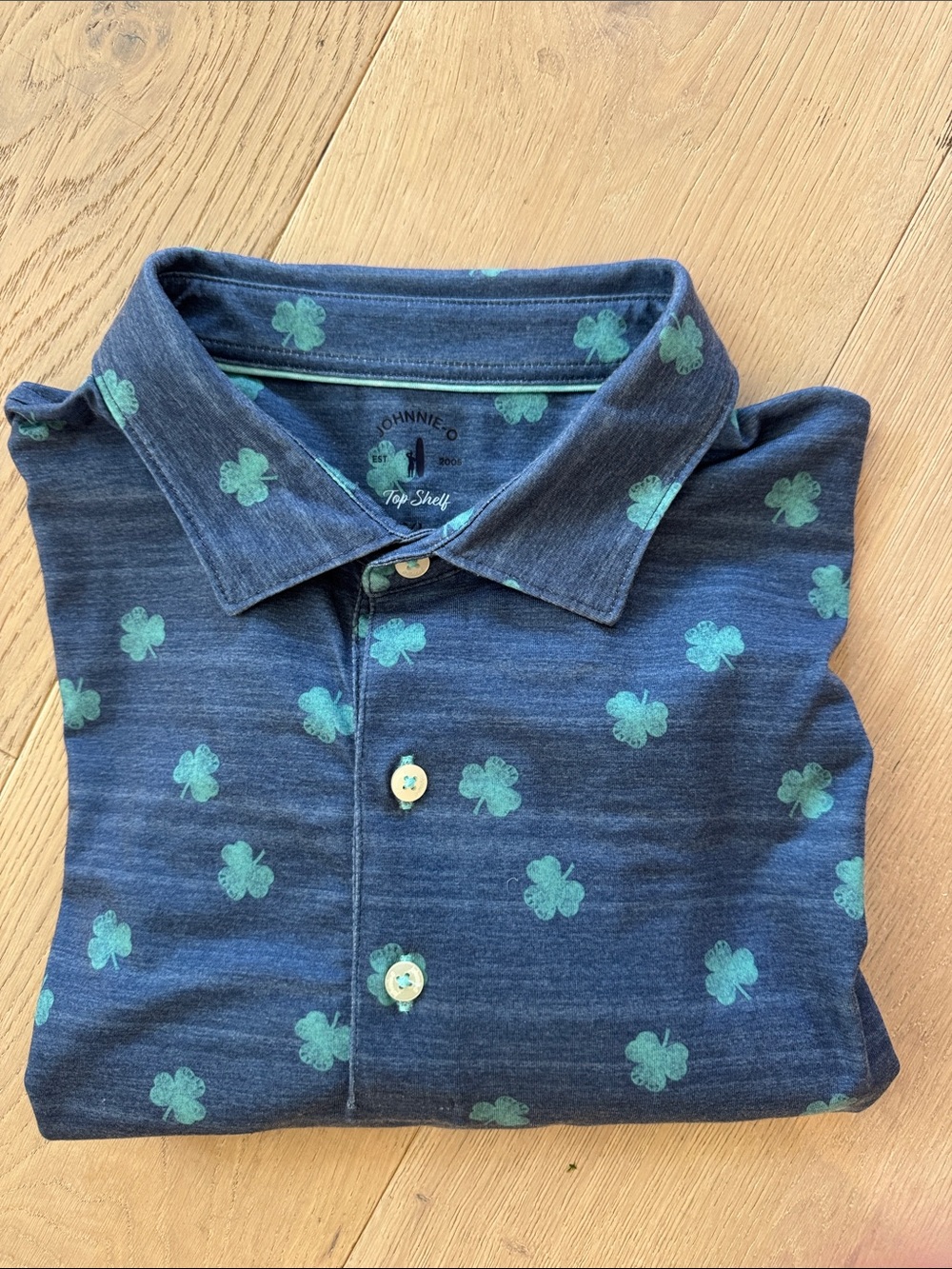 johnnie-O Blue Polo with Green Clover Motif